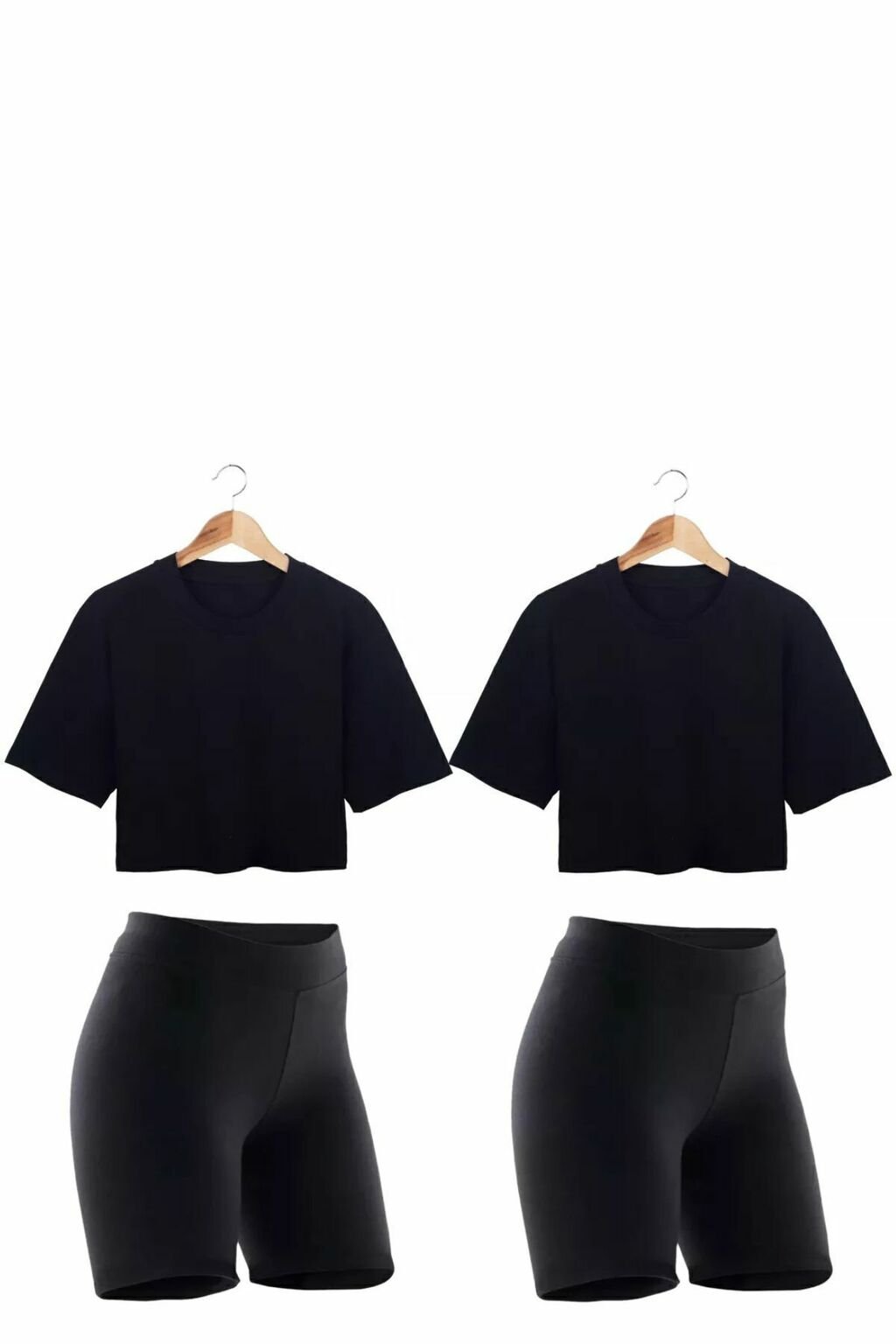 Combo de dos conjuntos deportivos para mujer en color negro, con calzas biker y boxy crop tops colgados en perchas